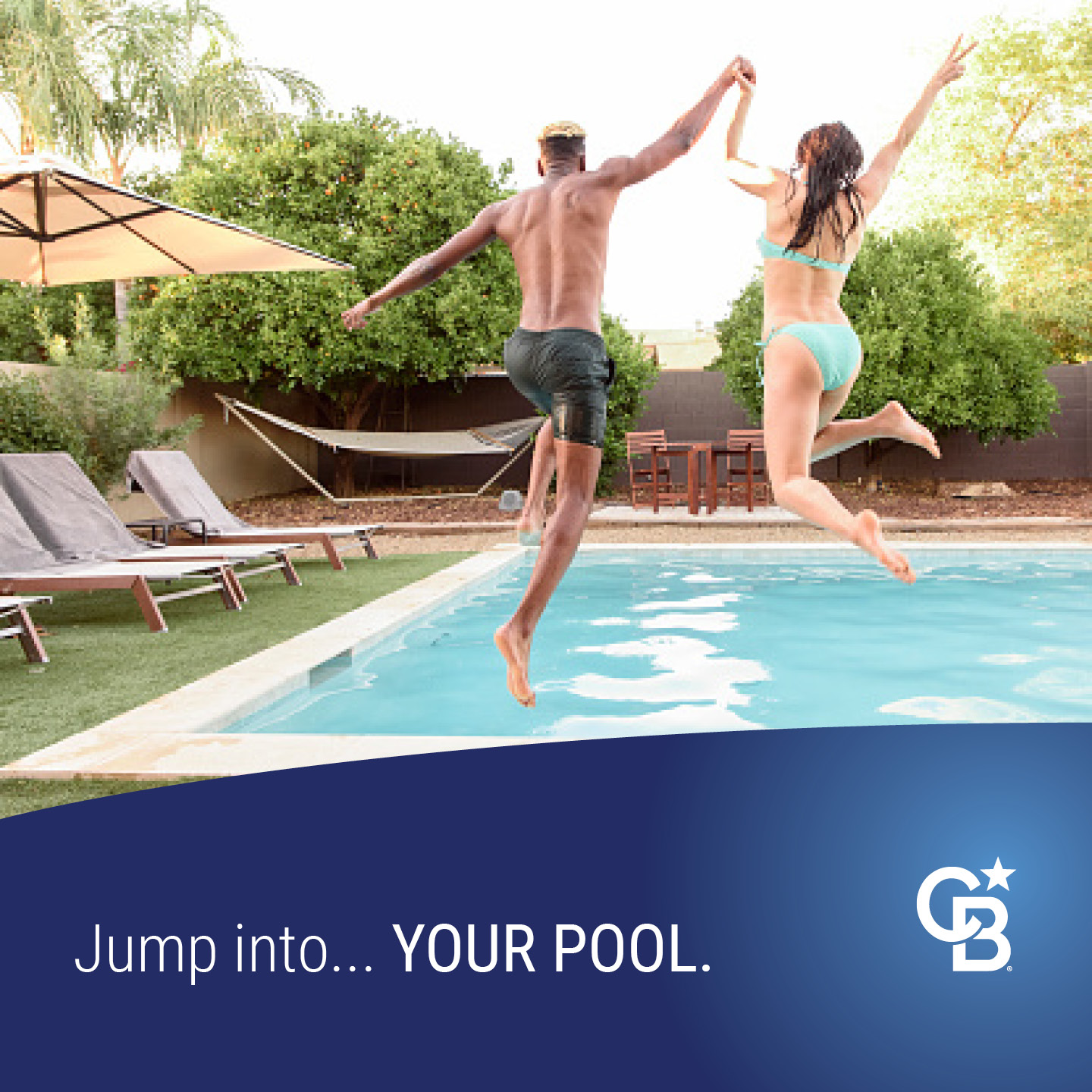 man and woman jumping into a swimming pool